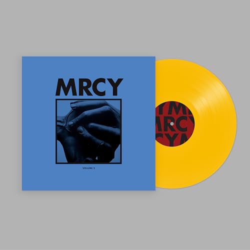 Yellow vinyl record with blue cover featuring hands in a frame.