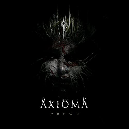 Dark album cover featuring a distorted face with thorny crown imagery.