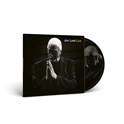 Black CD case with white-haired man in suit and hands clasped in prayer.