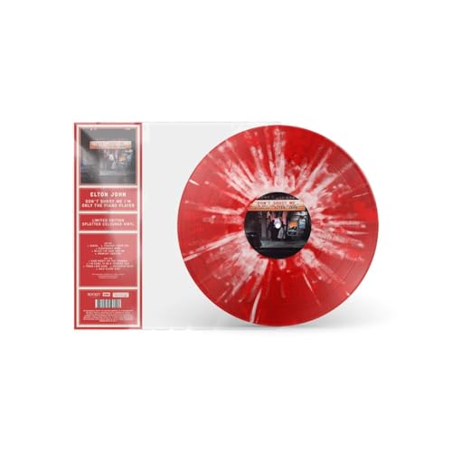 Red splattered vinyl record of Elton John’s “Don’t Shoot Me” album.