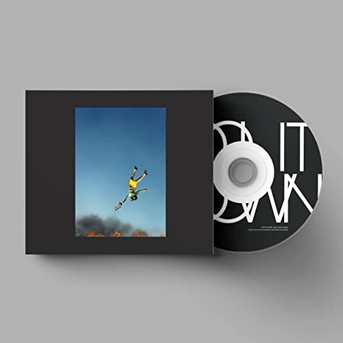 Yeah Yeah Yeahs "Cool It Down" CD with cover art of a falling figure.