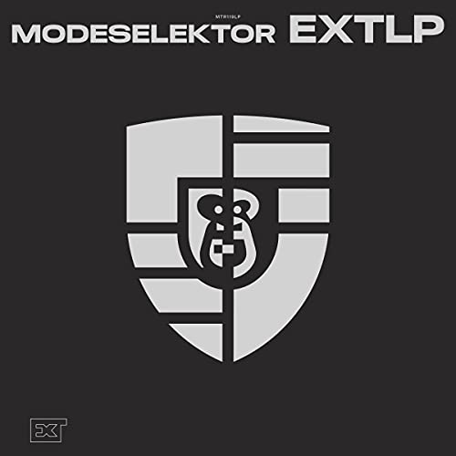 Modeselektor “Extlp” CD cover: dark gray background with a geometric shield design.