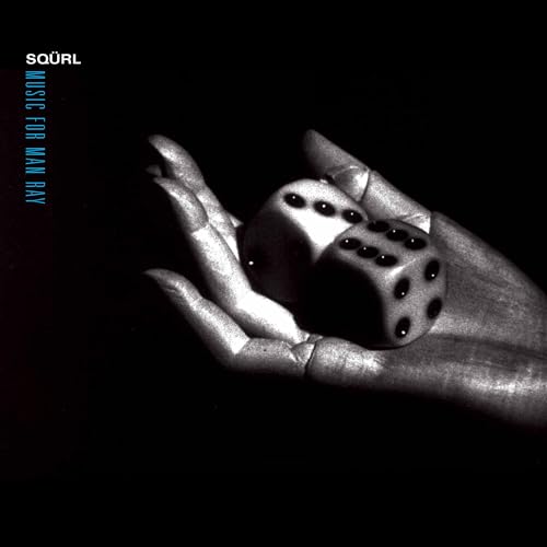 Black and white album cover featuring a hand holding a die.