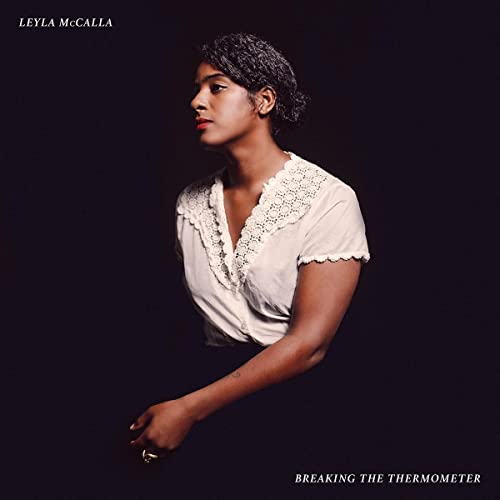 Leyla McCalla album cover: a woman in a light-colored blouse.