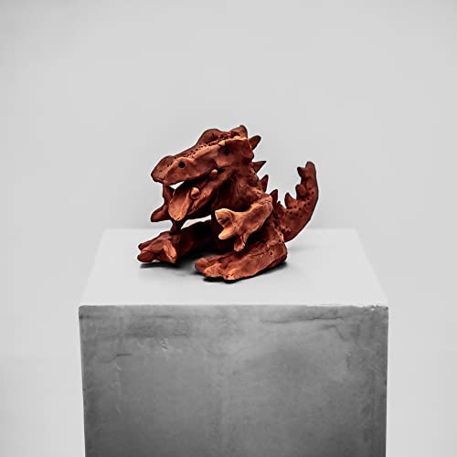 Brown, textured dinosaur sculpture sits atop a gray concrete block.
