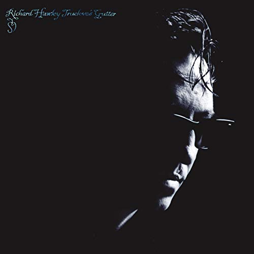 Richard Hawley album cover: a shadowed portrait of a man in sunglasses.