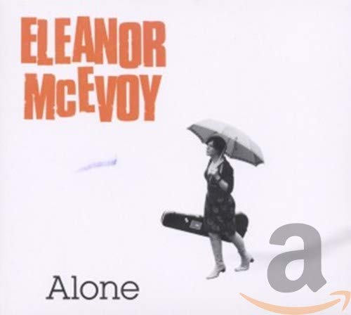 CD cover: Eleanor McEvoy walking with an umbrella and guitar case.
