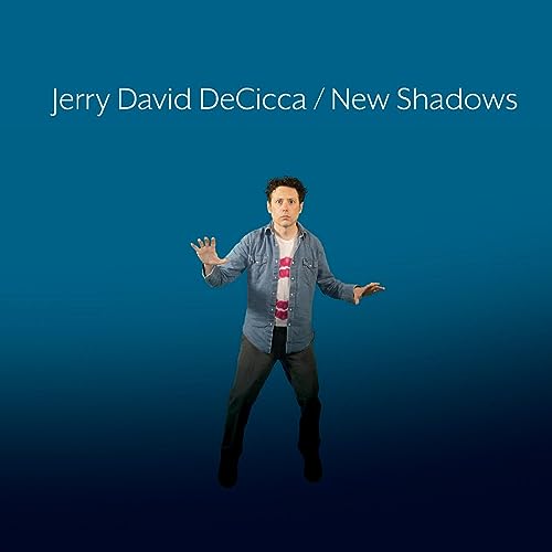 Album cover for Jerry David DeCicca’s “New Shadows” featuring a man in blue.