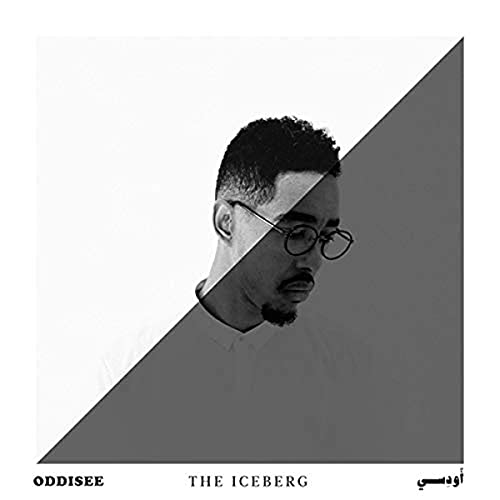 Oddisee album cover, black and white portrait split by a diagonal line.