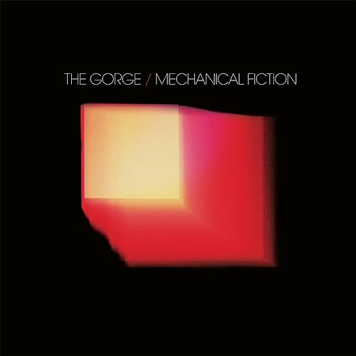 Vinyl record cover: black background with abstract red and yellow geometric shapes.