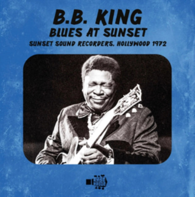 Blue album cover featuring a black and white photo of B.B. King playing guitar.