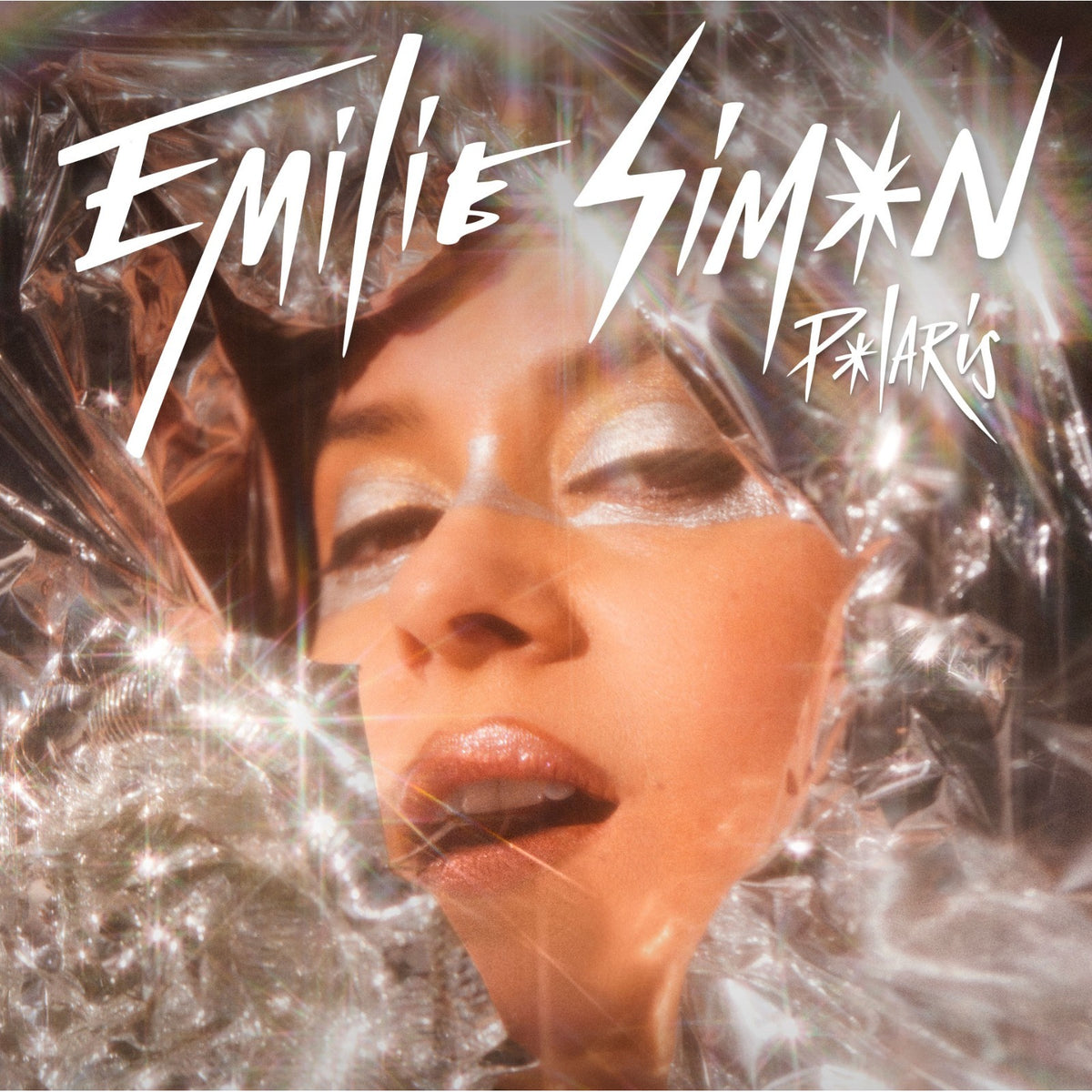 CD cover for Emilie Simon’s “Polaris” featuring a portrait and sparkles.