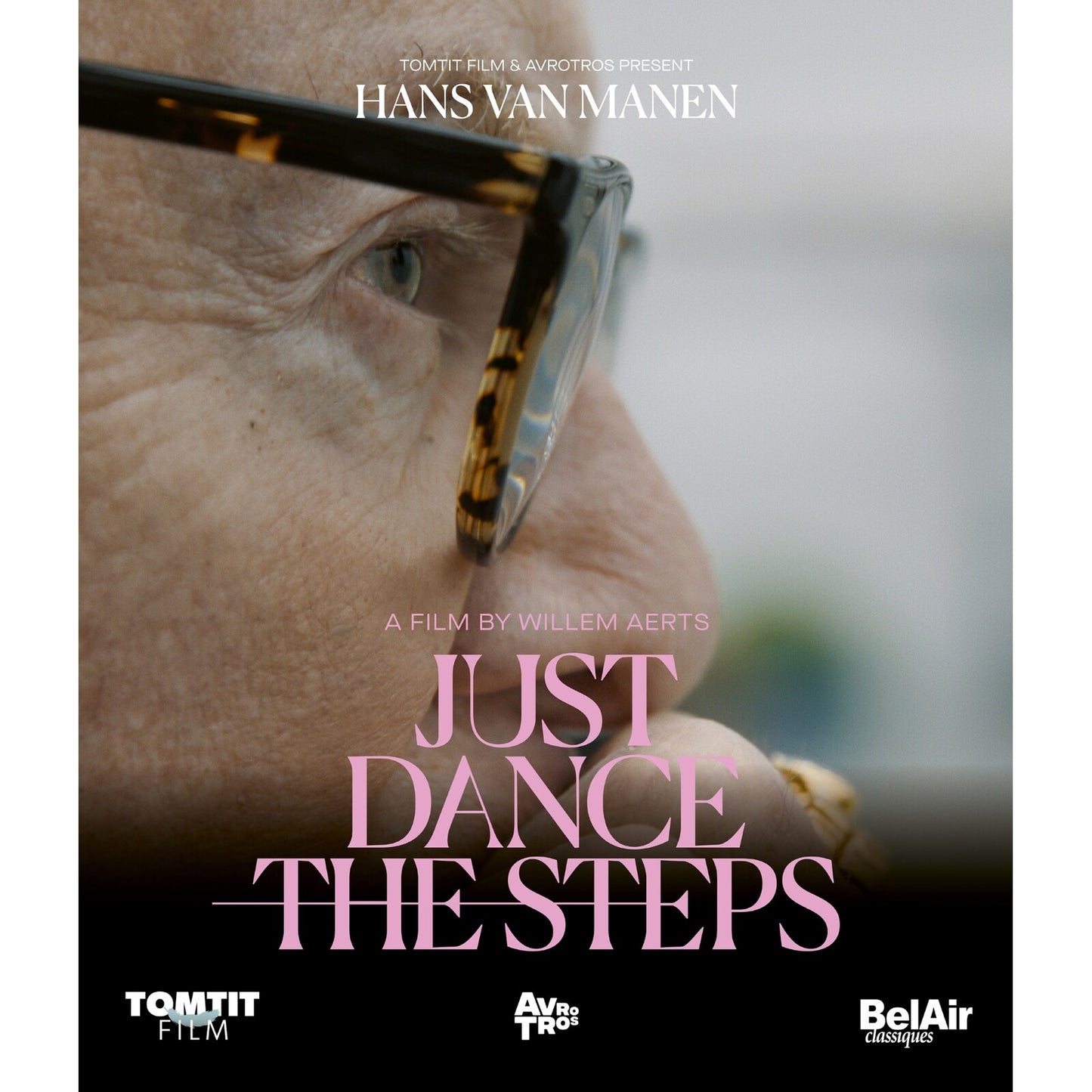 Close-up of a man wearing glasses, with film title “Just Dance The Steps”.