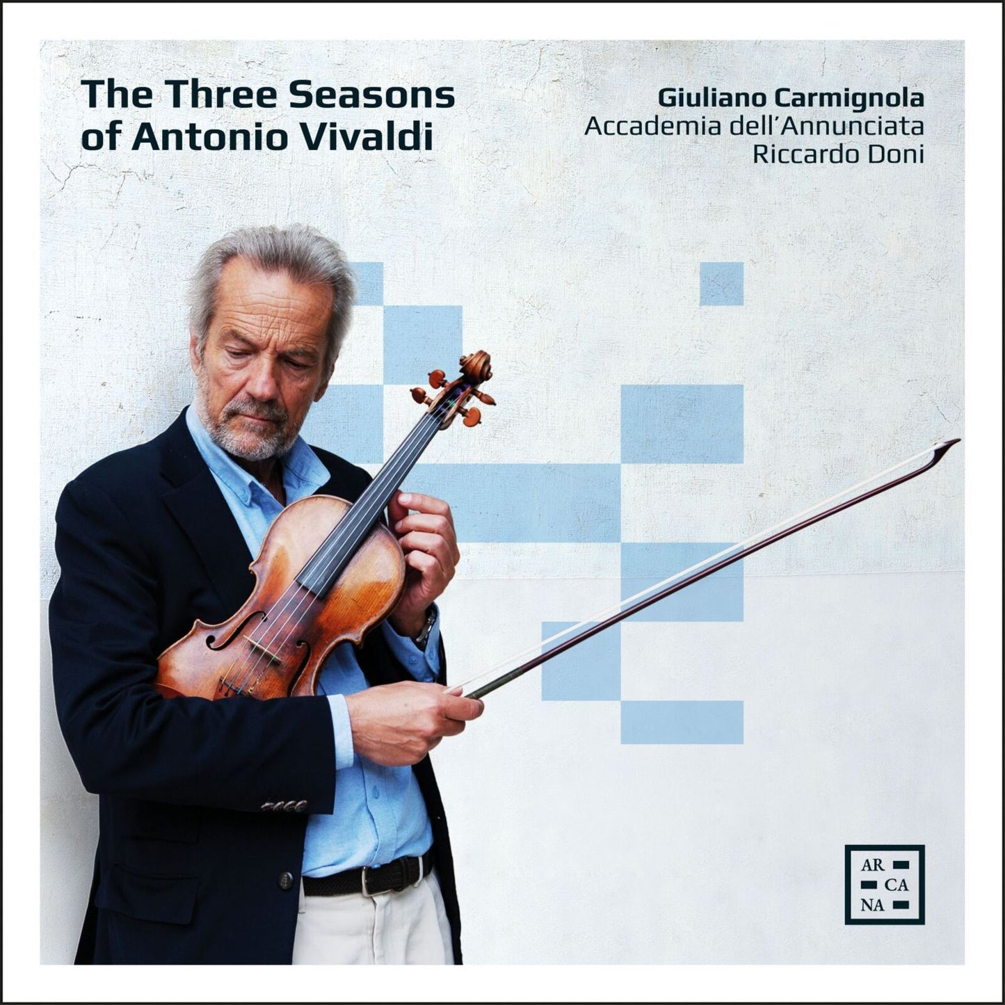 Violinist Giuliano Carmignola holding a violin, album cover for Vivaldi’s “The Three Seasons”.