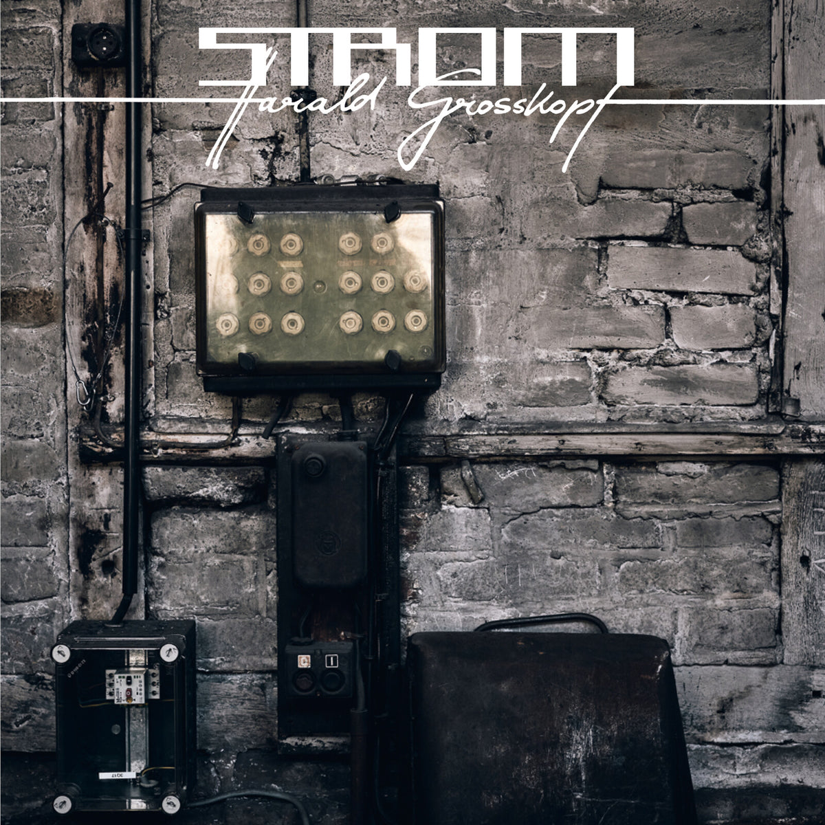 CD cover: old electrical panel on a brick wall, text "Strom".