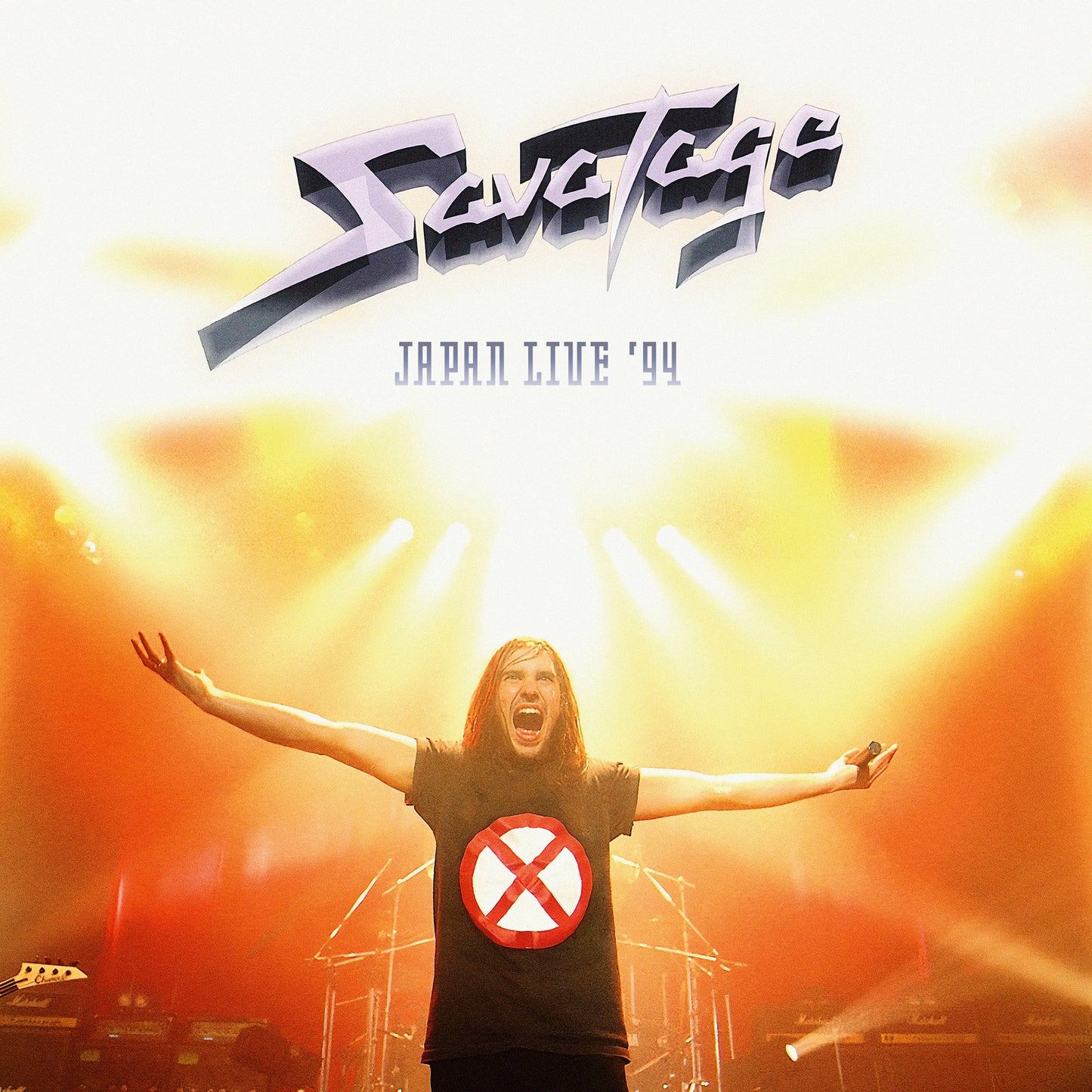 Savatage album cover: singer with arms raised on stage, Japan Live '94.
