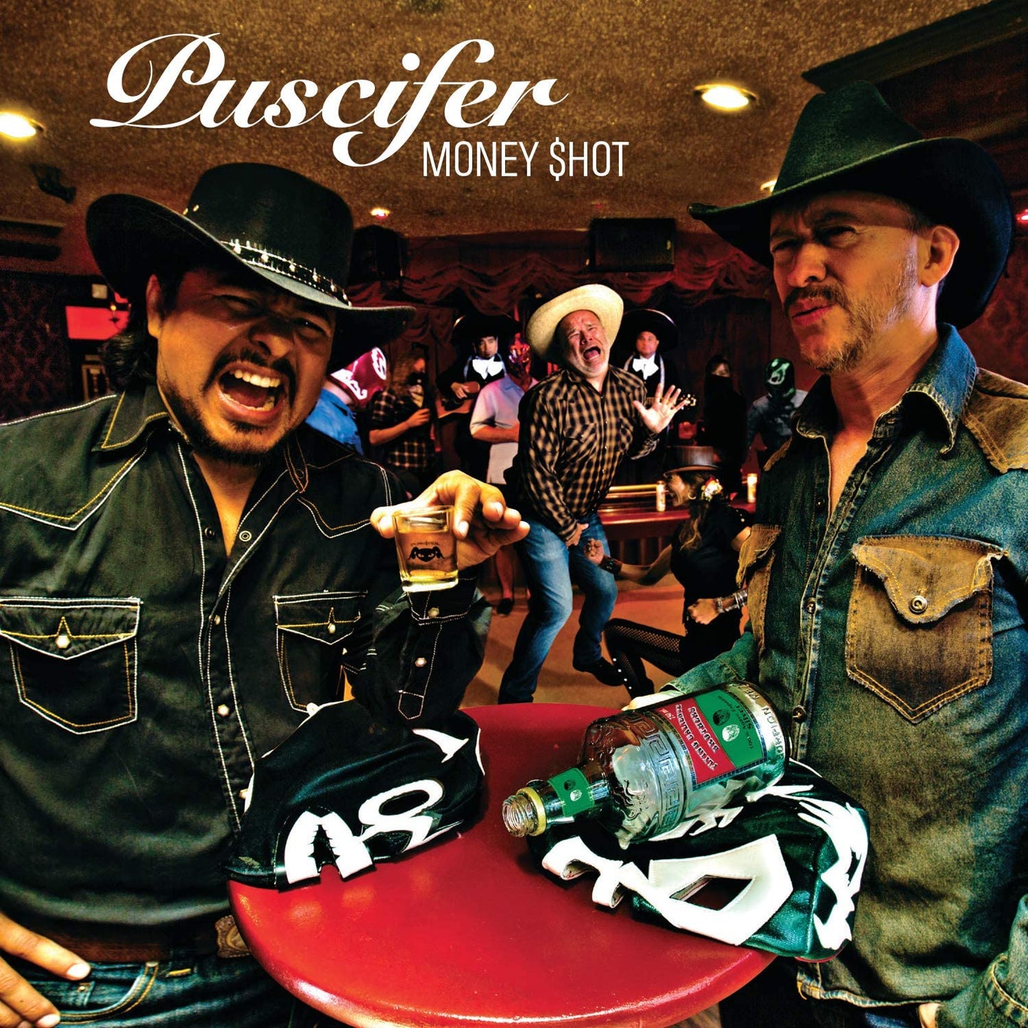 Puscifer album cover: men in cowboy hats in a bar scene.