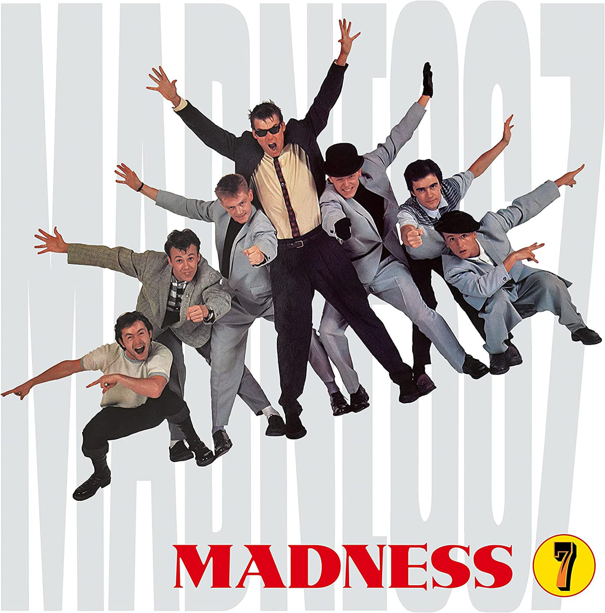 Album cover for Madness’ “7” featuring the band in suits and ties.