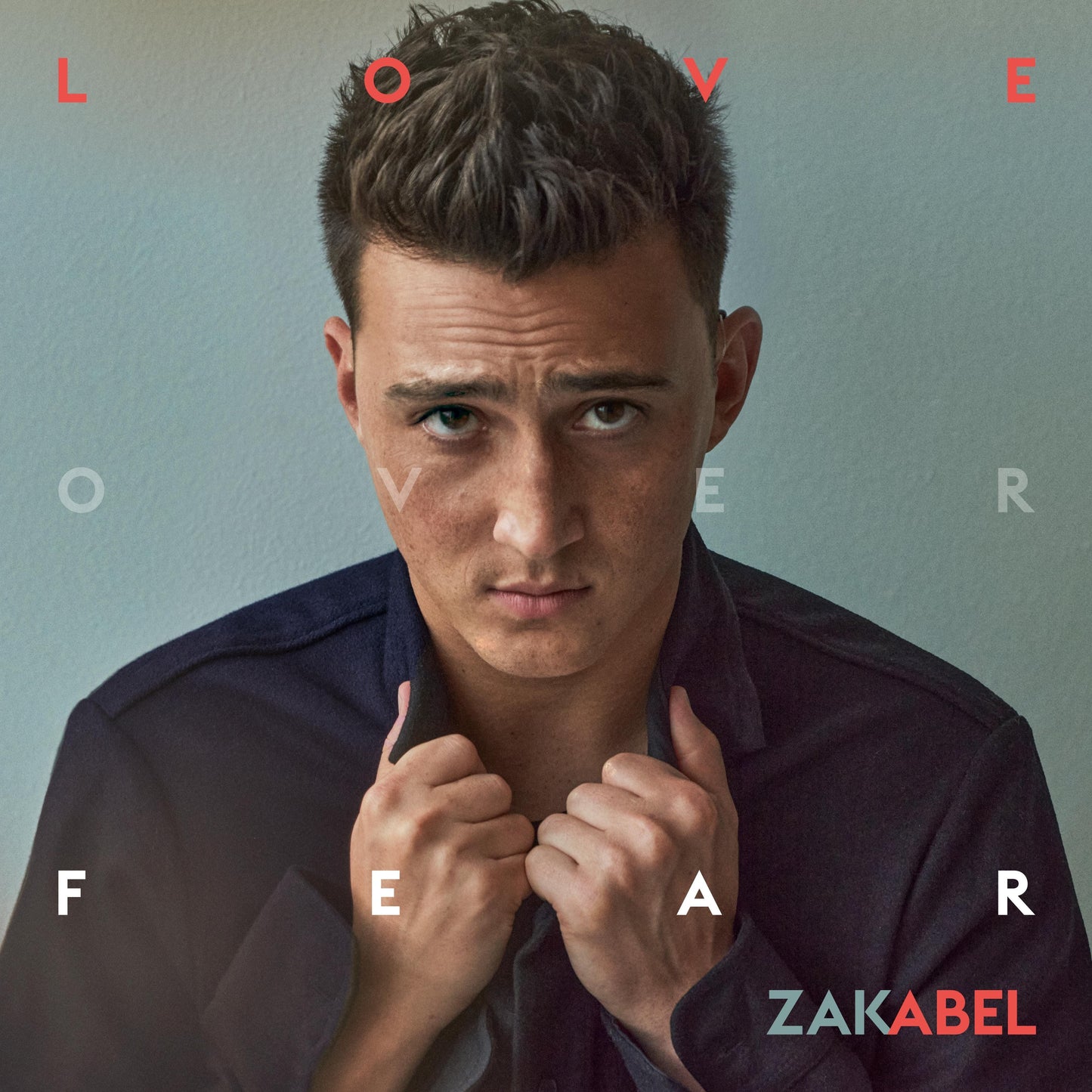 Zak Abel album cover: portrait of a man with red text overlay.