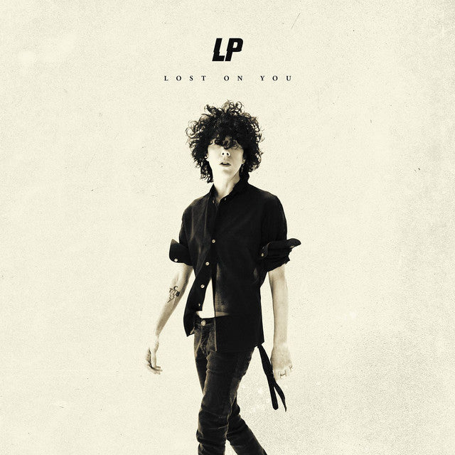 LP album cover, “Lost On You”, featuring a portrait of the artist.