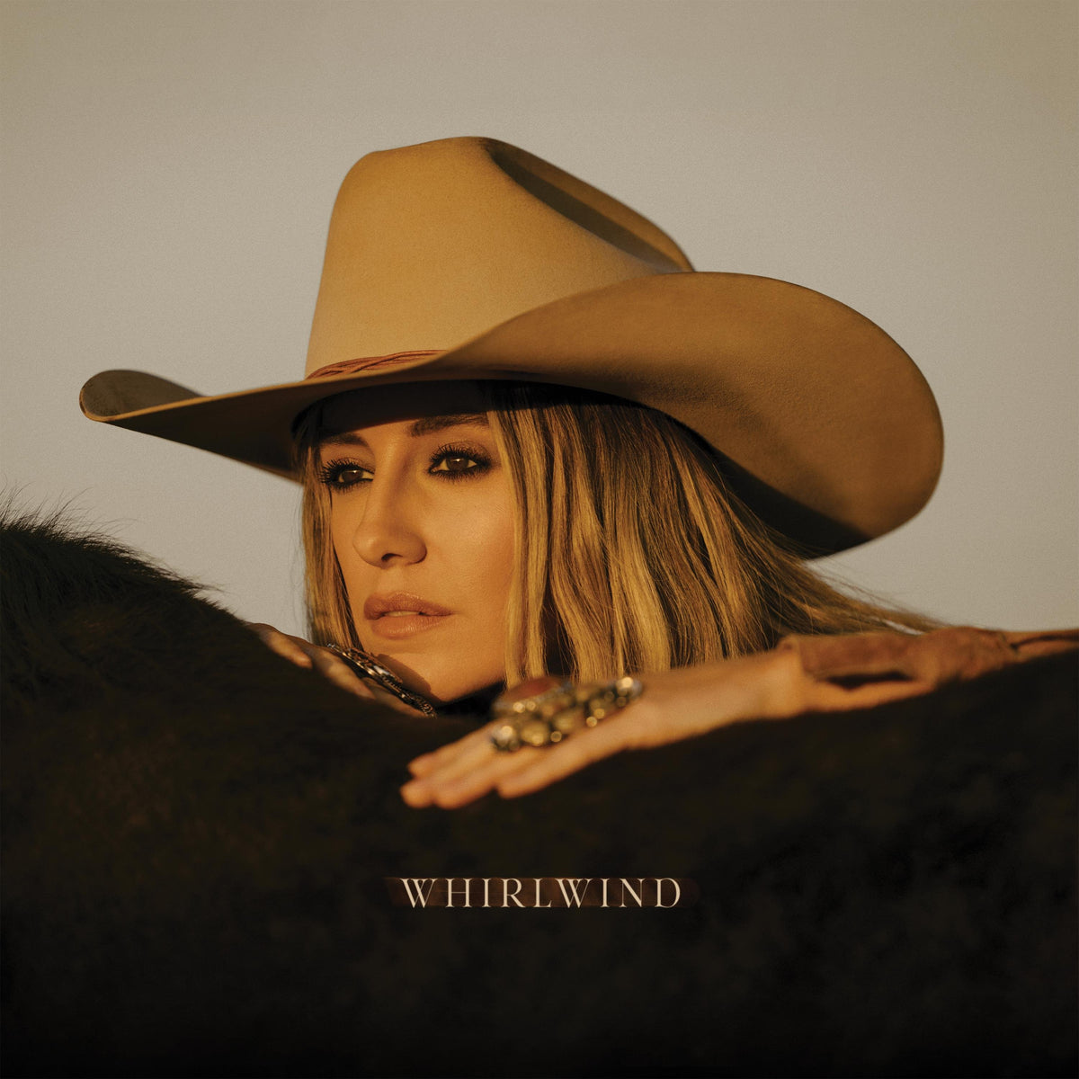 Lainey Wilson album cover: portrait of a blonde woman in a cowboy hat.