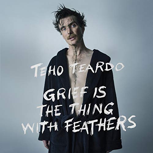 Teho Teardo album cover featuring a man in a dark robe, text overlay.