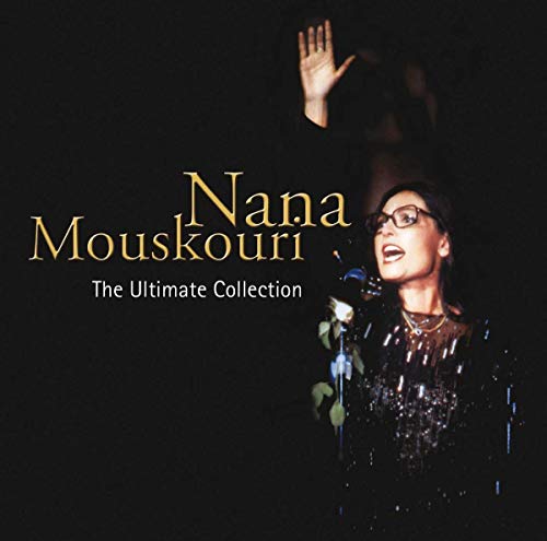 Nana Mouskouri singing into a microphone on a dark background with text overlay.
