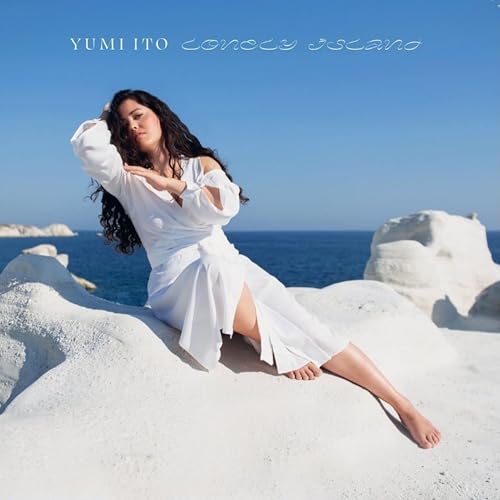 Yumi Ito album cover: woman in white dress on rocky beach.