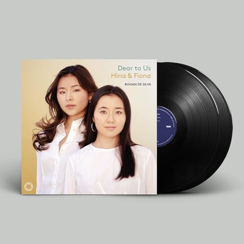 Vinyl record with album cover featuring two women in white shirts.
