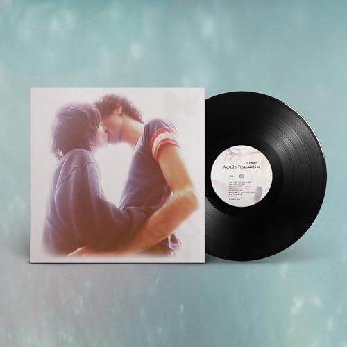 Vinyl record and album cover depicting a couple embracing.