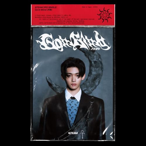 CD cover for &teamās āGo In Blindā featuring a man in a suit.