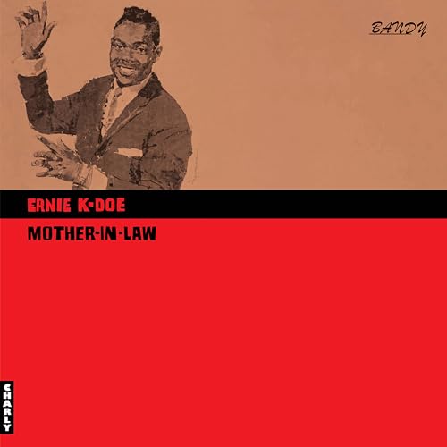 Ernie K-Doe album cover, portrait of a smiling man in a suit.