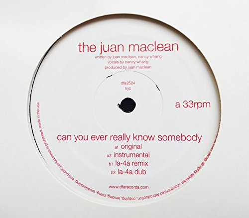 White vinyl record label with red text: "the juan maclean" and song title.