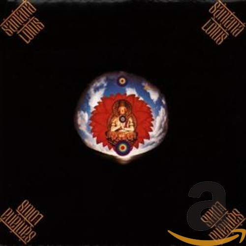 Black album cover for Santana’s “Lotus” featuring a lotus flower image.