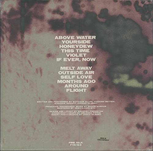 Vinyl record back cover with tracklist and credits in white text.