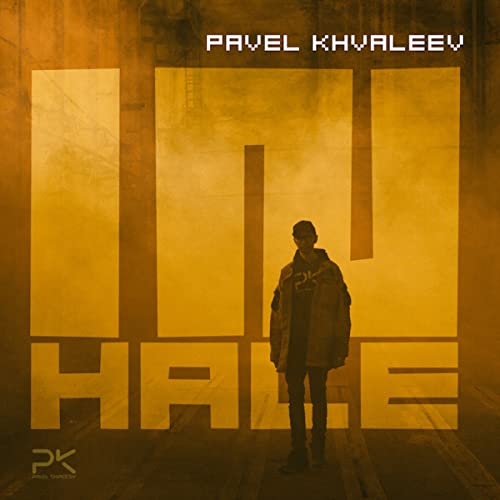 A man stands before a large, yellow-toned background with the word INHALE overlaid.