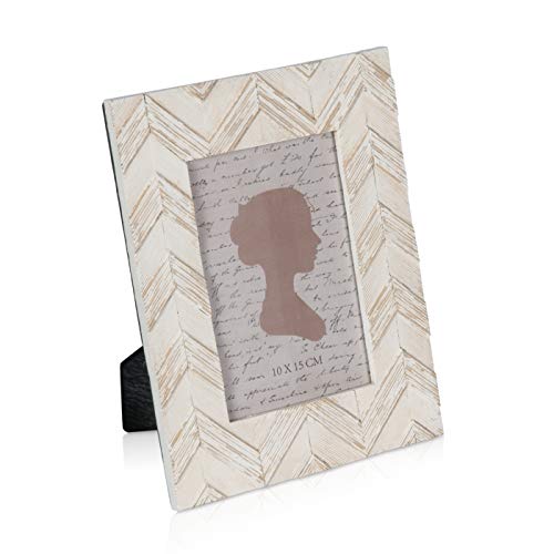 White textured frame holding a silhouette portrait and handwritten text.