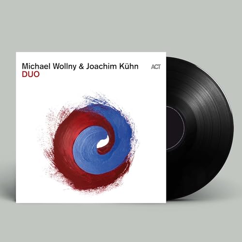 Vinyl record with white album cover featuring red and blue swirl design.
