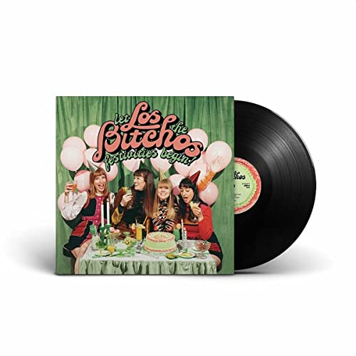 Vinyl record and album cover featuring a group celebrating with cake.