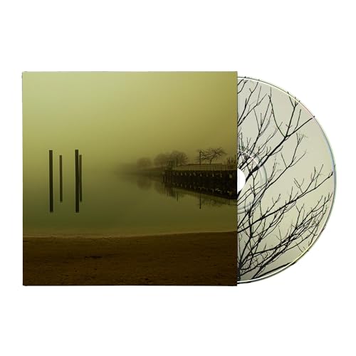 CD case and disc with a misty, wooded landscape image.