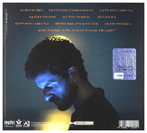 CD back cover: portrait of a man in blue light, barcode visible.