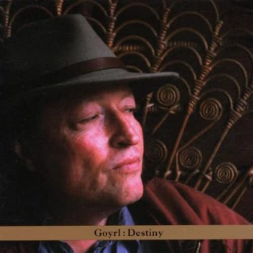 Close-up of a man in a hat, album cover “Goyrl: Destiny”.