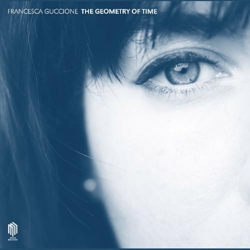 Album cover featuring a close-up of a person’s eye, in shades of blue.