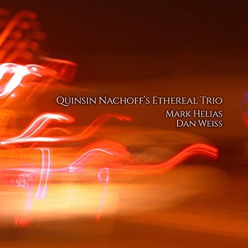 CD cover for Quinsin Nachoff Trio with abstract red light streaks.