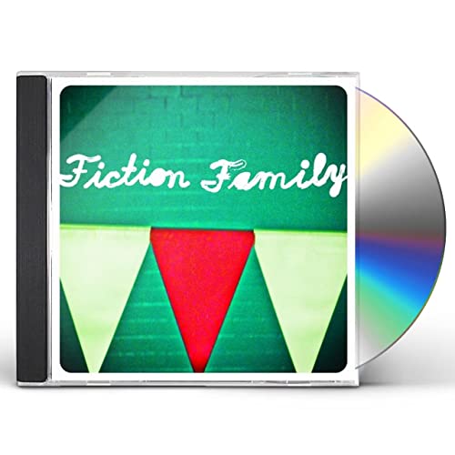 CD case with green and white geometric design, and silver disc.