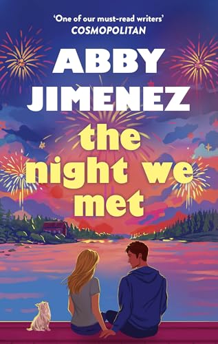Book cover: couple silhouetted against fireworks, with a small dog.