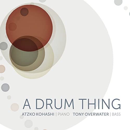 CD cover with overlapping circles and text: "A Drum Thing" by Tony Overwater.