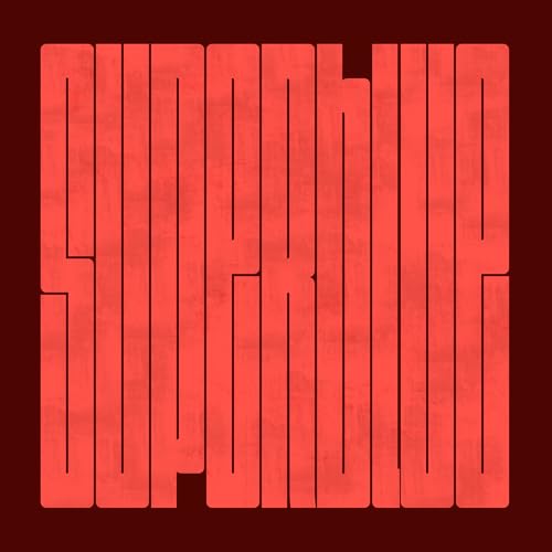 Red abstract geometric design spelling "SUPERBLUE" on a dark red background.