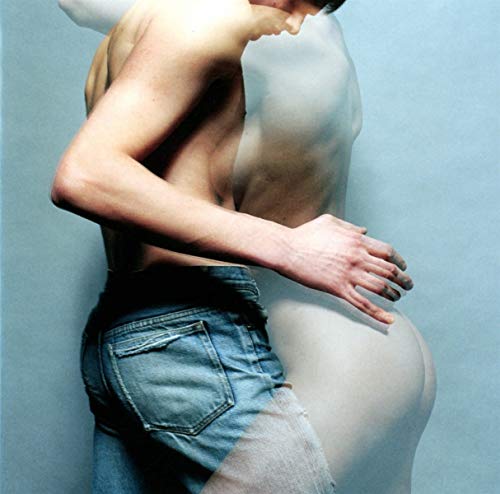 CD cover: two figures embracing, one translucent, against a blue background.