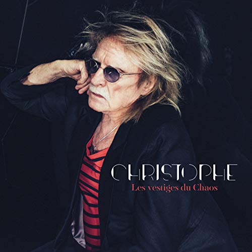 Album cover featuring a portrait of musician Christophe in a suit.